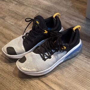 Nike Black and White Athletic Shoes with Yellow Highlights